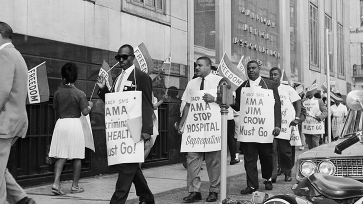 People marching against hospital segragation.